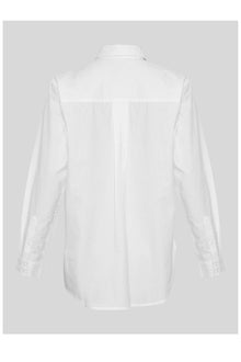 MSCH Copenhagen Olisa Shirt in white, crafted from 100% organic cotton with a loose fit and smooth finish. Features a classic pointed collar, full button front closure, long sleeves with buttoned cuffs, and a softly curved hem for an effortless everyday style.
