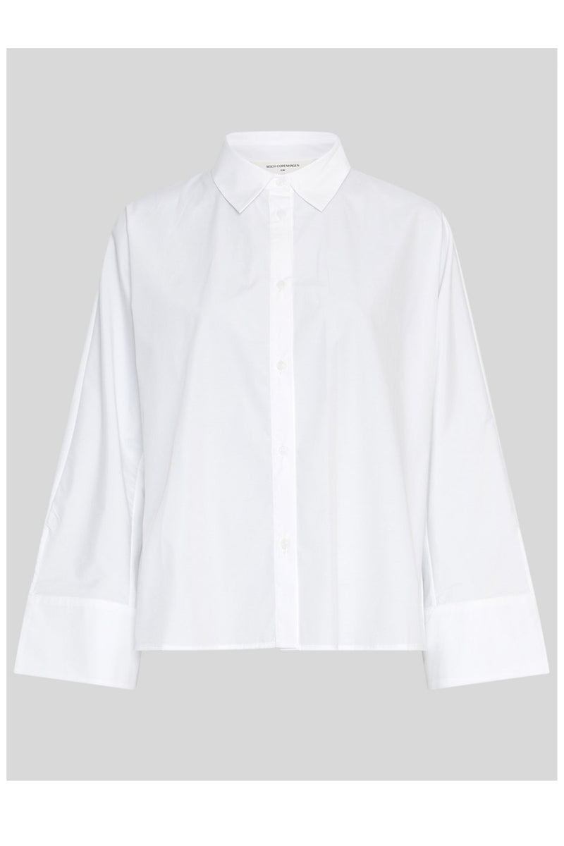 MSCH Copenhagen NATALIA ZENIKA Boxy Shirt in black with a clean structured silhouette, classic collar and full front button closure. Features long sleeves with wide cuffs and an adjustable back button detail to define the waist or wear loose. Crafted from a smooth recycled polyester and cotton blend.