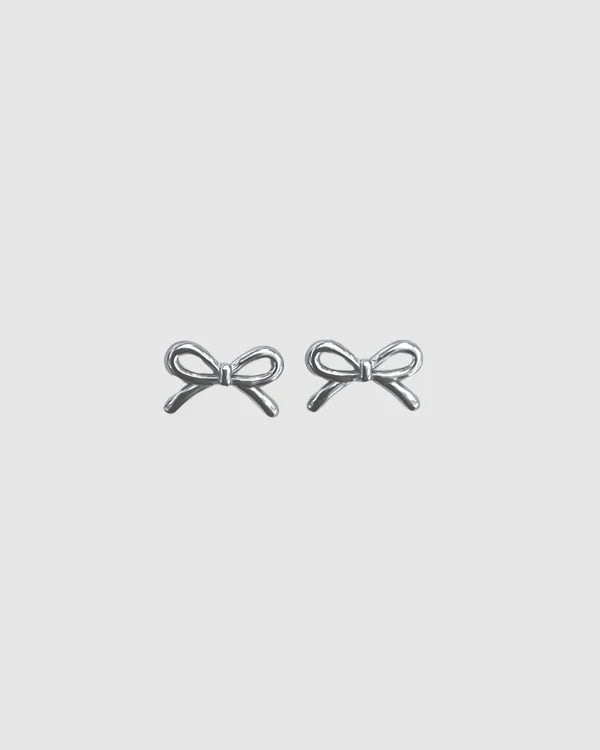 Refined yet playful, the Castel & Co Mini Bow Earrings in medium silver give the classic bow a modern edge. Their polished finish and graceful curves create subtle shine, offering a versatile stud that feels both feminine and contemporary.

Material: Stainless steel
Closure Type: Stud
Earring Size: 20 mm
Waterproof and hypoallergenic
Weight: 1.5g