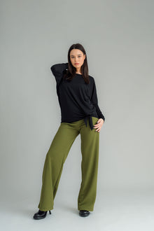 NES Dolly Bird Pants are back and better than ever! These wide-leg pants feature a versatile fold-down waistband that can be worn up or folded for a customizable fit. Whether you’re dressing up or down, these pants will quickly become your go-to wardrobe staple for years to come. Available in two lengths: