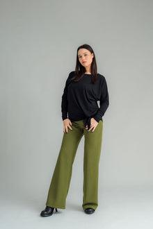 NES Dolly Bird Pants are back and better than ever! These wide-leg pants feature a versatile fold-down waistband that can be worn up or folded for a customizable fit. Whether you’re dressing up or down, these pants will quickly become your go-to wardrobe staple for years to come. Available in two lengths: 