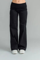 NES Dolly Bird Pants are back and better than ever! These wide-leg pants feature a versatile fold-down waistband that can be worn up or folded for a customizable fit. Whether you’re dressing up or down, these pants will quickly become your go-to wardrobe staple for years to come. Available in two lengths: