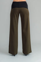 the Famous NES Dolly Bird Pants are back and better than ever! These wide-leg pants feature a versatile fold-down waistband that can be worn up or folded for a customizable fit. Whether you’re dressing up or down, these pants will quickly become your go-to wardrobe staple for years to come. Available in two lengths: