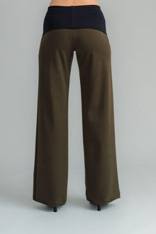 the Famous NES Dolly Bird Pants are back and better than ever! These wide-leg pants feature a versatile fold-down waistband that can be worn up or folded for a customizable fit. Whether you’re dressing up or down, these pants will quickly become your go-to wardrobe staple for years to come. Available in two lengths: