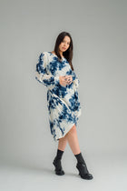 NES, Glide Dress. Flow dress but with long sleeves for added warmth and versatility. Multi-seasonal dress perfect for casual and formal occasions. Wear it draped down the front for a relaxed look, or cinch it up at the side with the adjustable side button and hem loopers for a more defined shape. The long sleeves feature elasticated loopers and a metal shank cuff button for added detail. Composition: viscose georgette