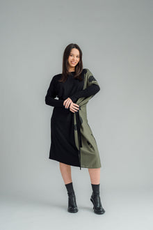  NES Legend Dress is a stylish contrast fabric dress that effortlessly combines a woven print fabric with a soft, stretchy viscose for the perfect blend of comfort and style. This versatile piece is ideal for both work and casual wear, and can easily transition through the seasons. 