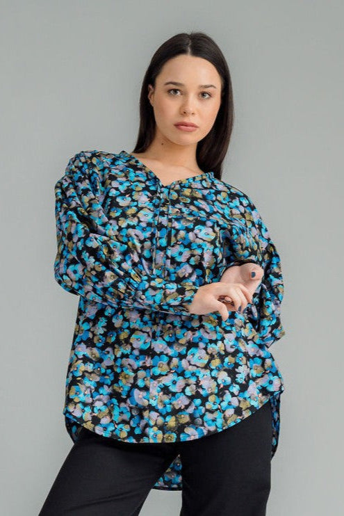  NES Mia Shirt is your ultimate go-to for effortless style. Featuring a drawcord neck that can be adjusted for a tighter fit, this shirt offers both versatility and comfort. The wide traditional cuff detail with a single metal shank button and elastic looper adds a stylish touch of refinement. This trans-seasonal piece is perfect for layering, making it easy to dress up or down depending on the occasion. 