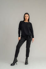 Load image into Gallery viewer, NES Merino LEISURE Top is a versatile piece, perfect for pairing with your favourite denim, Dolly B pants, Drilled Gin pants, or the Ribs skirt. This top features a self-tie at the side that can be adjusted to your liking—tied tight for a more structured look or looped loose for a relaxed feel. With its batwing design and cigarette sleeves, it offers a flattering silhouette that adds slimness to your lower arms while providing maximum comfort. 100% MERINO
