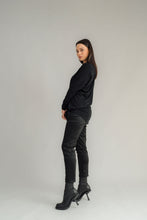 Load image into Gallery viewer, NES Merino LEISURE Top is a versatile piece, perfect for pairing with your favourite denim, Dolly B pants, Drilled Gin pants, or the Ribs skirt. This top features a self-tie at the side that can be adjusted to your liking—tied tight for a more structured look or looped loose for a relaxed feel. With its batwing design and cigarette sleeves, it offers a flattering silhouette that adds slimness to your lower arms while providing maximum comfort. 100% MERINO
