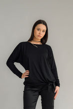 Load image into Gallery viewer, NES Merino LEISURE Top is a versatile piece, perfect for pairing with your favourite denim, Dolly B pants, Drilled Gin pants, or the Ribs skirt. This top features a self-tie at the side that can be adjusted to your liking—tied tight for a more structured look or looped loose for a relaxed feel. With its batwing design and cigarette sleeves, it offers a flattering silhouette that adds slimness to your lower arms while providing maximum comfort. 100% MERINO

