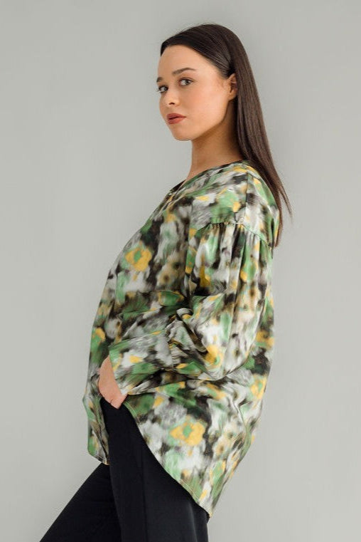  NES Mia Shirt is your ultimate go-to for effortless style. Featuring a drawcord neck that can be adjusted for a tighter fit, this shirt offers both versatility and comfort. The wide traditional cuff detail with a single metal shank button and elastic looper adds a stylish touch of refinement. This trans-seasonal piece is perfect for layering, making it easy to dress up or down depending on the occasion. 