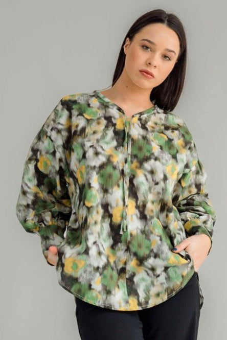  NES Mia Shirt is your ultimate go-to for effortless style. Featuring a drawcord neck that can be adjusted for a tighter fit, this shirt offers both versatility and comfort. The wide traditional cuff detail with a single metal shank button and elastic looper adds a stylish touch of refinement. This trans-seasonal piece is perfect for layering, making it easy to dress up or down depending on the occasion. 