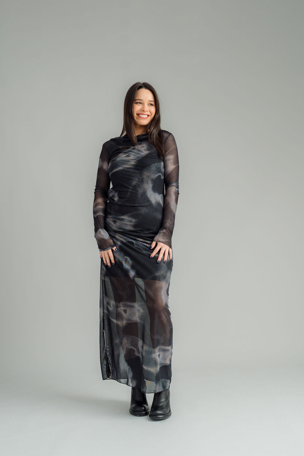 NES Milly Dress is the ultimate body-con layering piece, designed for versatile styling all year round. Wear it on its own with a NES Lattice slip underneath for a sleek, simple look, or layer it over cigarette pants with your favourite knitwear and a winter jacket for added warmth and style. Featuring shirring at the waist, this dress creates flattering ruching around the waist and hip area, enhancing your natural curves.