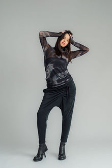 NES, Roxy Pant. Featuring a flat front with an elasticated back and side pockets for added practicality, the Roxy pant is designed for all-day comfort. The angled draw cord front detail allows you to adjust the fit. Poly Nylon
