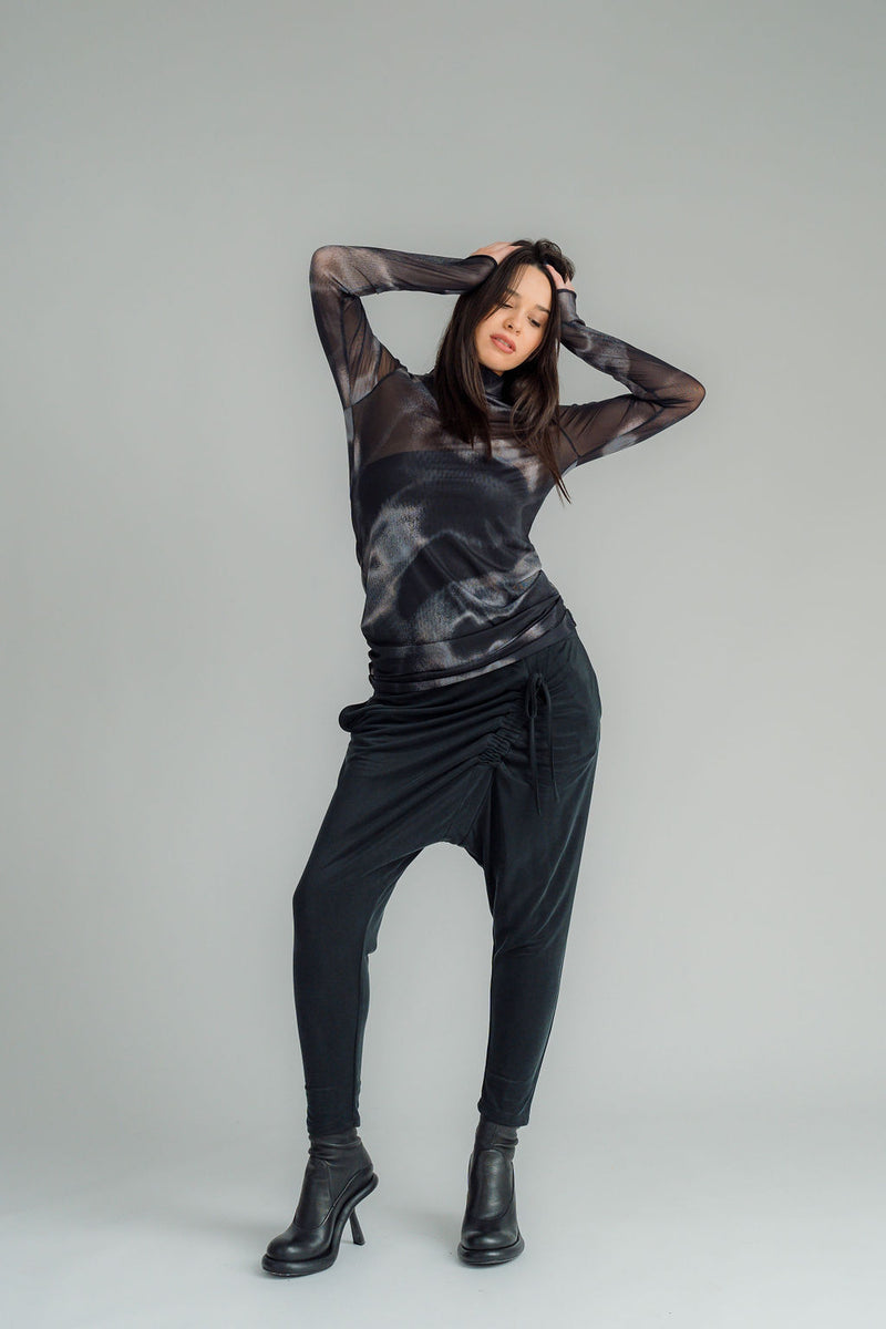NES, Roxy Pant. Featuring a flat front with an elasticated back and side pockets for added practicality, the Roxy pant is designed for all-day comfort. The angled draw cord front detail allows you to adjust the fit. Poly Nylon