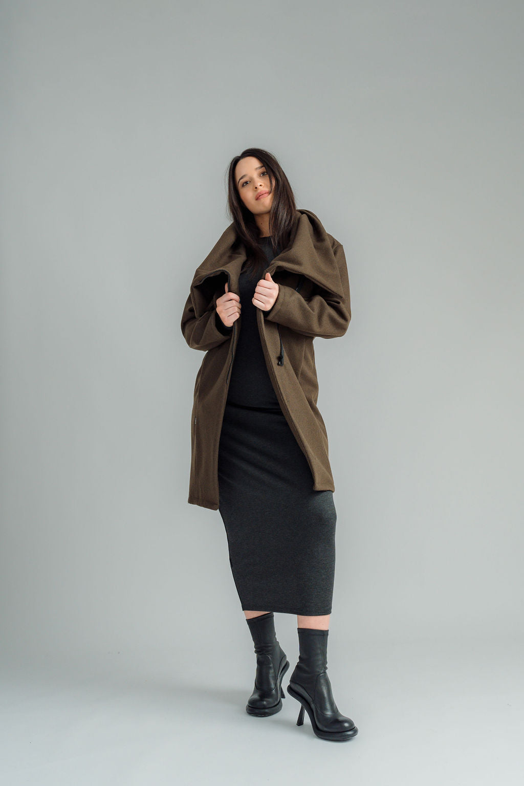 NES, Studio 54 Dress. Batwing sleeves that taper into sleek cigarette cuffs, side seam ruching, and a centre back split. Made from a stretchy knit, it offers a flattering fit that moves with you. Composition: viscose spandex
