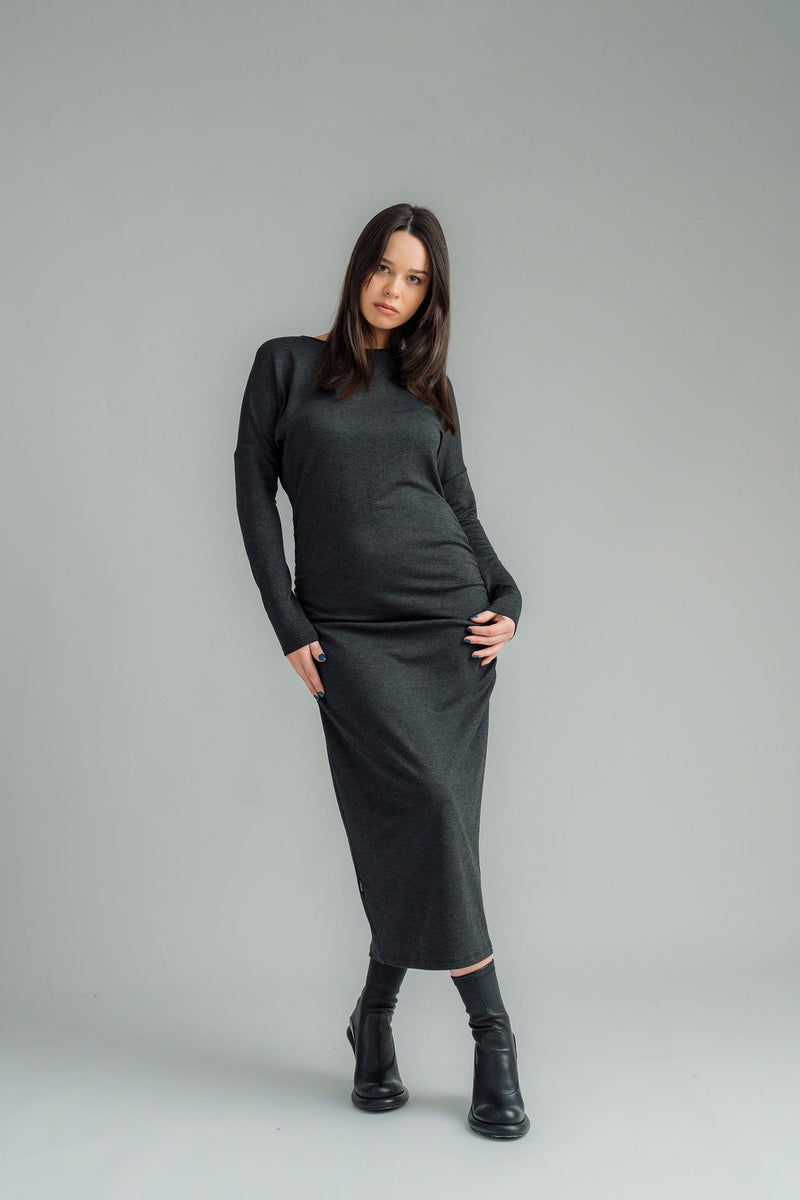 NES, Studio 54 Dress. Batwing sleeves that taper into sleek cigarette cuffs, side seam ruching, and a centre back split. Made from a stretchy knit, it offers a flattering fit that moves with you. Composition: viscose spandex