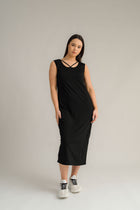 NES Merino Long Lattice Dress is your perfect companion for the cooler months. Made from soft, breathable merino wool, this versatile piece can be worn as a sleek dress or layered as a cozy base. Its relaxed fit through the body and straight hem provide a comfortable yet flattering silhouette, while fine strap detailing adds a touch of elegance. The dress is fully reversible, offering two stylish looks in one! With a length that finishes approximately 10-15cm below the knee 100% merino