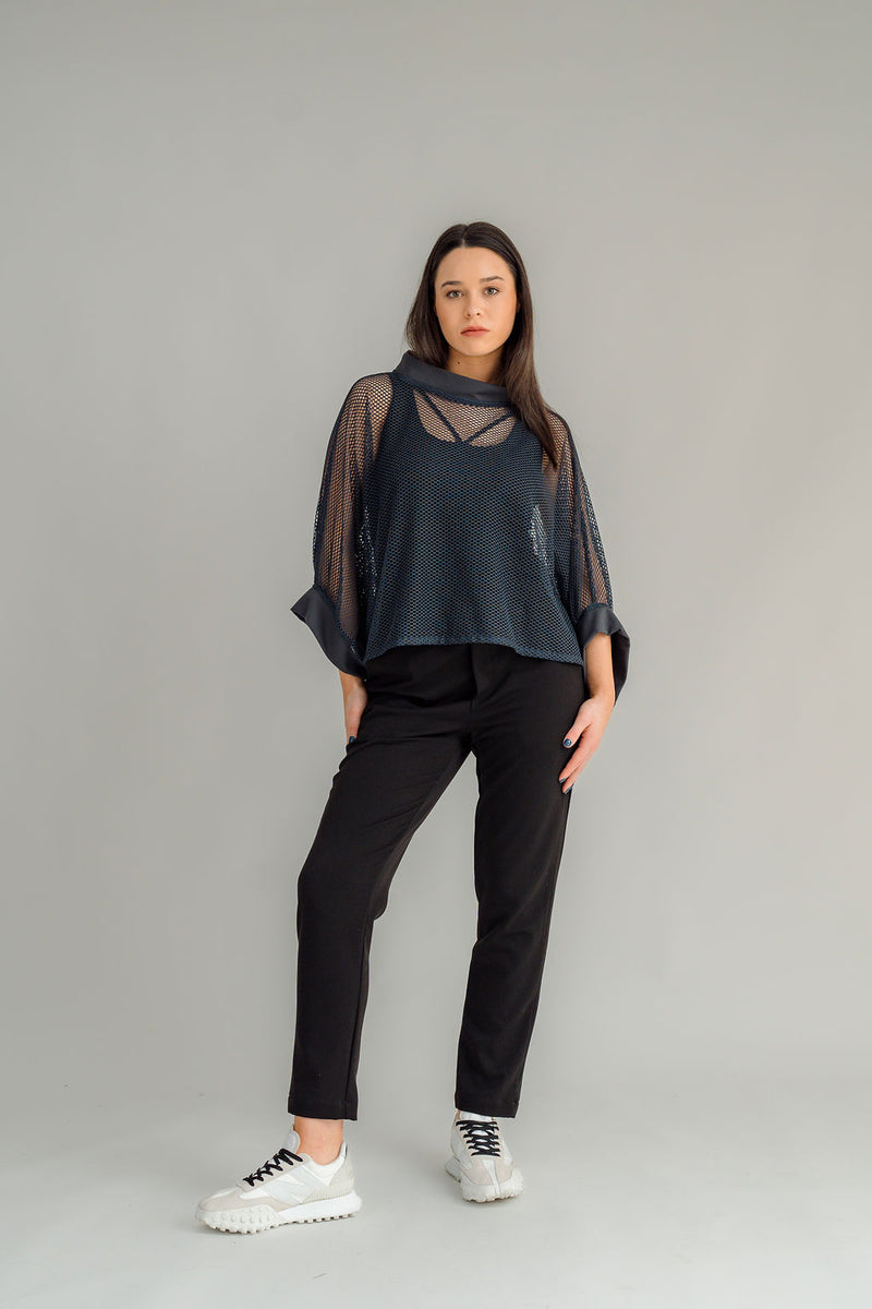 The NES Lilly Pant is a fresh new style designed for both comfort and impact. Featuring a sleek straight leg in a flattering 7/8 length, this pant is elevated with a bold racer-style contrast stripe along the side seam. Thoughtfully detailed with a curved back yoke, faux front fly, and side seam pockets, the Lilly Pant combines structure with everyday ease. The elasticated waistband and soft 2-way stretch fabric ensure a comfortable, flexible fit, making it an effortlessly versatile piece