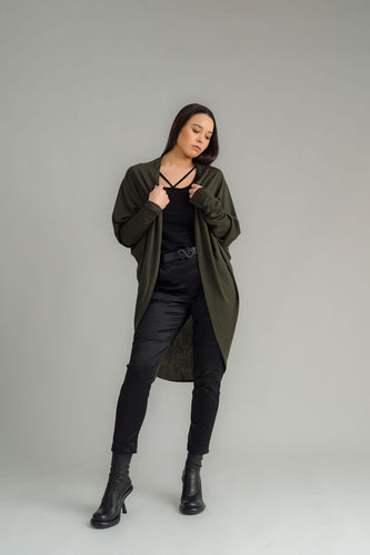 NES Voltage cardi is perfect for layering or a great trans-seasonal piece, Flattering batwing sleeve, Dress up or down, Can be worn multiple ways - by flipping the cardi upside down so the hem is worn around your neck. by doing this you will get either a shorter hip length cardi or a longer length cardi - falling mid thigh (at the back) 100% merino