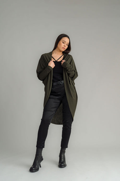 NES Voltage cardi is perfect for layering or a great trans-seasonal piece, Flattering batwing sleeve, Dress up or down, Can be worn multiple ways - by flipping the cardi upside down so the hem is worn around your neck. by doing this you will get either a shorter hip length cardi or a longer length cardi - falling mid thigh (at the back) 100% merino