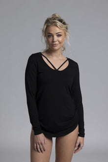 NES Lattice Long Sleeve Top. Featuring long sleeves and fine strap detailing. The curved hemline adds a flattering touch, while the reversible stretchy knit fabric—ensuring it’s not see-through—offers two stylish options in one.
