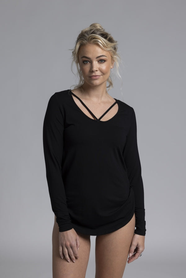 NES Lattice Long Sleeve Top. Featuring long sleeves and fine strap detailing. The curved hemline adds a flattering touch, while the reversible stretchy knit fabric—ensuring it’s not see-through—offers two stylish options in one.