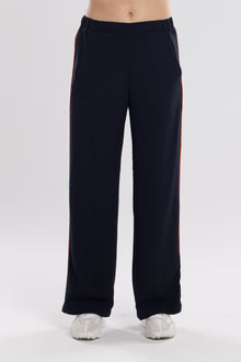 The N-E-S Piped Gin Pants – a timeless straight-leg pant with flat front, elastic back and refined piping. Breathable, Black, Ink. Best seller. polished and NZ made.