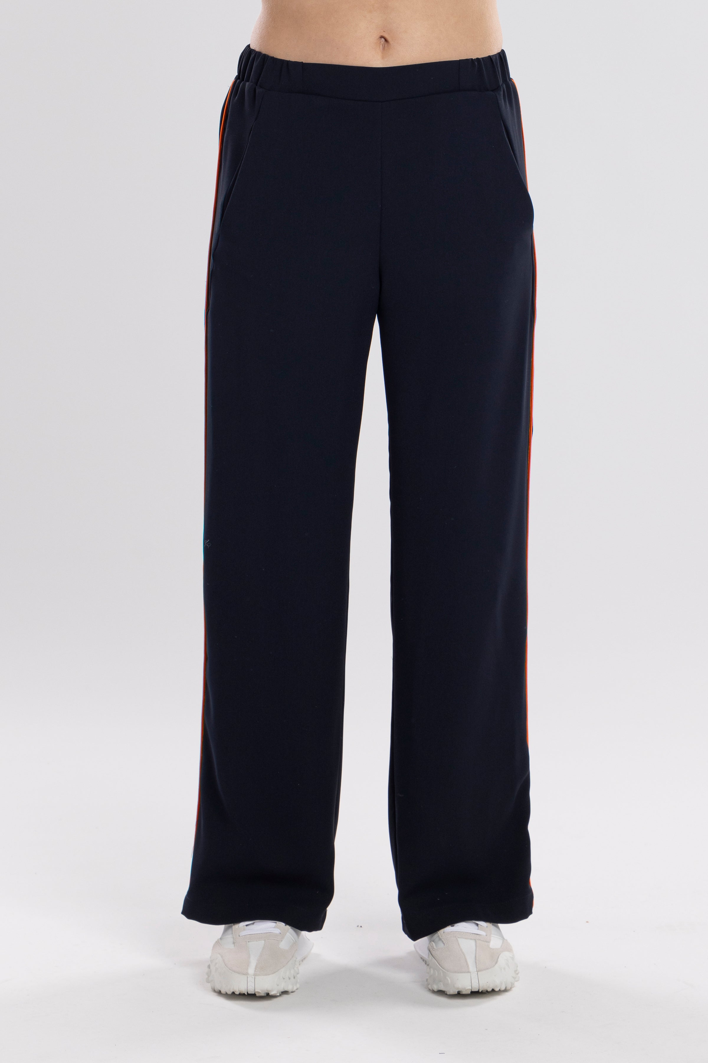 The N-E-S Piped Gin Pants – a timeless straight-leg pant with flat front, elastic back and refined piping. Breathable, Black, Ink. Best seller. polished and NZ made.