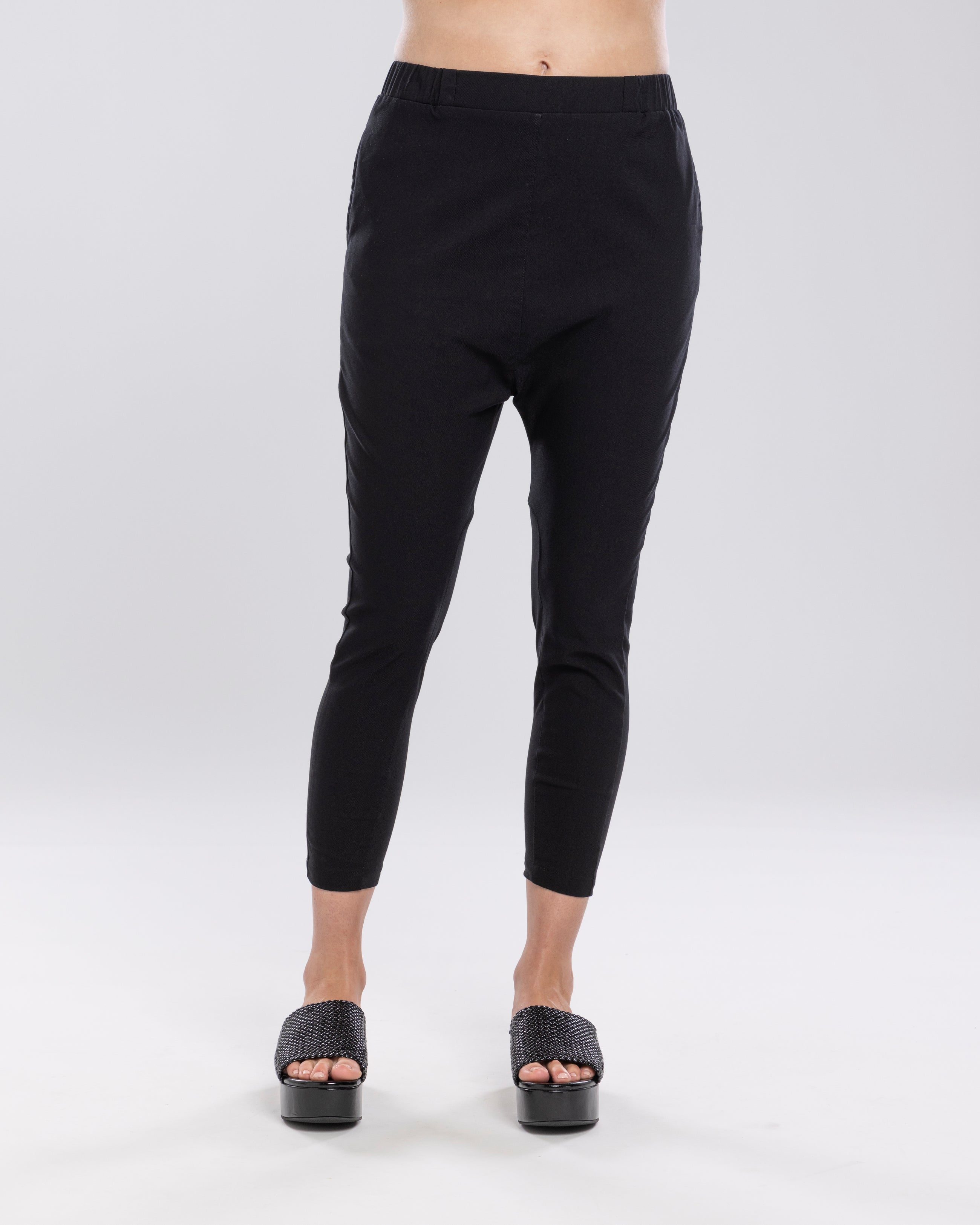 Reefer pant is a drop subtle crotch style - great to dress up and down. Side Seam pockets, elasticated waistband with front waistband detailing to give the front a flattering finish.
The back hip has a curved back yoke dealing to help great a flattering and slimming line.