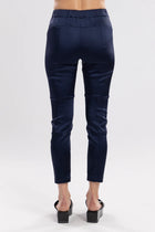 The Satin Section Pant is your go-to slightly more dressy NES essential, offering effortless style and unmatched comfort. With fabulous spliced detailing, this pant combines a sleek flat front with an elasticated back for the perfect fit. Side pockets provide practicality, while the 7/8 length and satin finish add an elevated touch to your look. Whether you're dressing up for a night out, office wear, or a special occasion, these versatile pants can easily be styled for any event. 