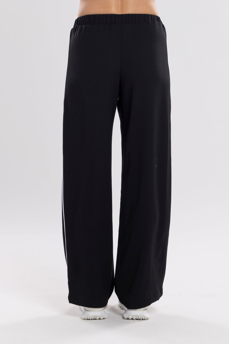 NES Piped Gin Pant - Black/White.  contrast side seam piping detail. feature a flattering, classic cut. ideal work pant and an effortless everyday style. With a flat front, covered elasticated back, and flattering angled pockets. Made from an easy-wearing poly fabric that’s floaty, cool to the touch