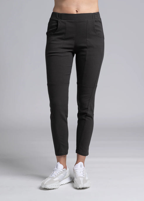 NES Section Pant is the perfect blend of style and comfort, featuring fabulous spliced detailing that adds a modern edge to your look. With a sleek flat front and an elasticated back, these pants offer a comfortable and flattering fit. Practical side pockets enhance the design, while the length finishes just above the ankle, creating a chic, tailored silhouette. Ideal for both casual and dressier occasions