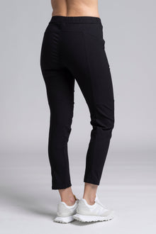 NES Section Pant is the perfect blend of style and comfort, featuring fabulous spliced detailing that adds a modern edge to your look. With a sleek flat front and an elasticated back, these pants offer a comfortable and flattering fit. Practical side pockets enhance the design, while the length finishes just above the ankle, creating a chic, tailored silhouette. Ideal for both casual and dressier occasions