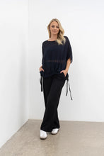 Load image into Gallery viewer, The Vanotti Tunic is our best-selling NES Top and for good reason – it&#39;s your ideal easy throw-on piece! With a flattering feature hemline, you can either draw it in for a more structured look or leave it loose for a relaxed, effortless style. The scoop neckline adds a touch of sophistication, making it the perfect choice for any occasion. Pair it back with our NES Lattice Singlet or Electra Slip for a complete ensemble. Versatile, comfortable, and stylish – the Vanotti Tunic is a wardrobe must-have!
