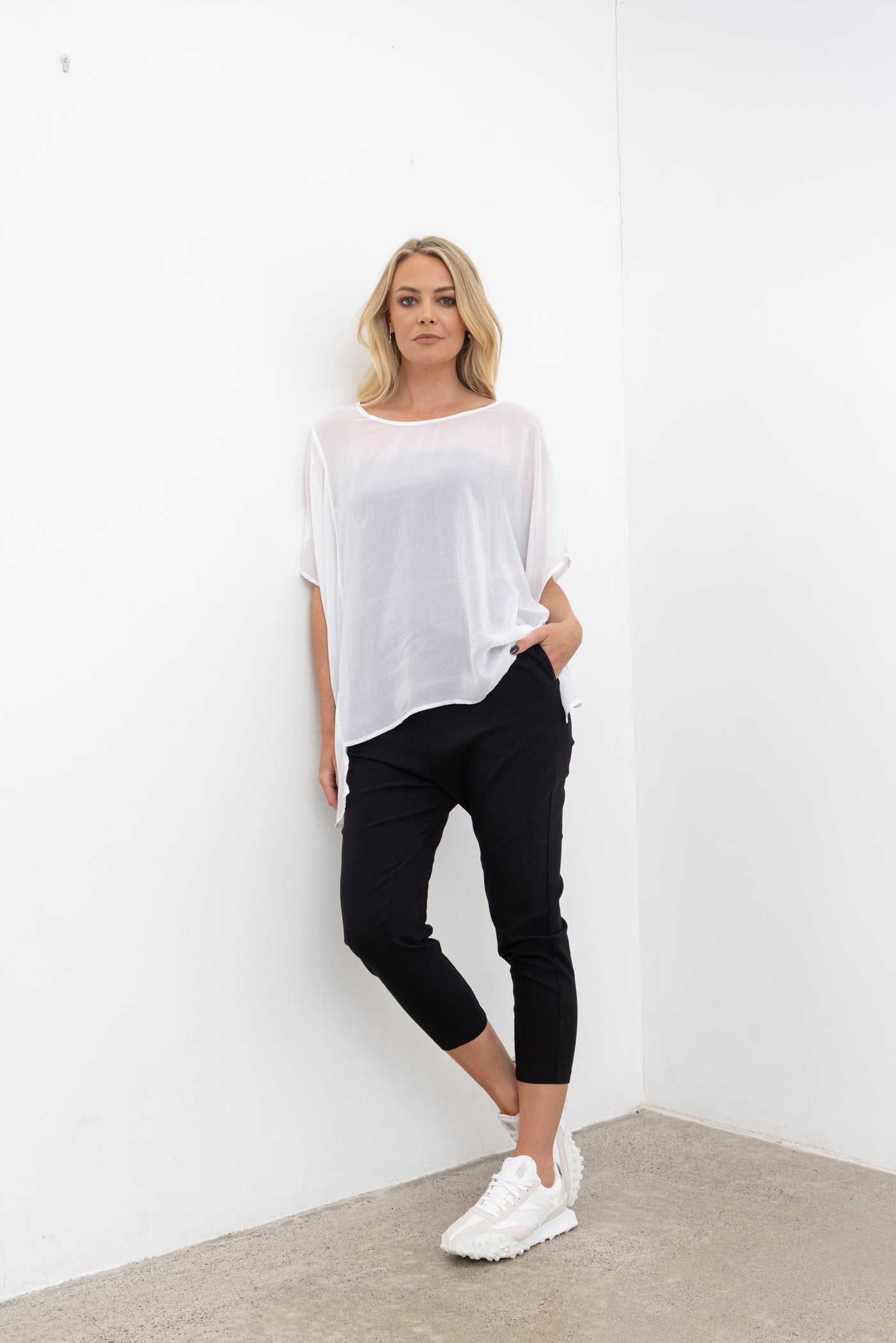 Reefer pant is a drop subtle crotch style - great to dress up and down. Side Seam pockets, elasticated waistband with front waistband detailing to give the front a flattering finish.
The back hip has a curved back yoke dealing to help great a flattering and slimming line.