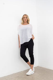 Reefer pant is a drop subtle crotch style - great to dress up and down. Side Seam pockets, elasticated waistband with front waistband detailing to give the front a flattering finish.
The back hip has a curved back yoke dealing to help great a flattering and slimming line.