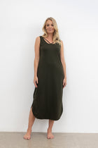 The NES Reversible Lattice Merino Slip is a&nbsp;layering essential with a clever twist — the Reversible Lattice Merino Slip offers two looks in one with its versatile design. Made from soft, breathable merino in our signature lattice knit, it's perfect for wearing under sheer styles or on its own as a luxe lounge piece. The slim fit sits comfortably against the body, providing warmth without bulk, and transitions seamlessly across seasons.
