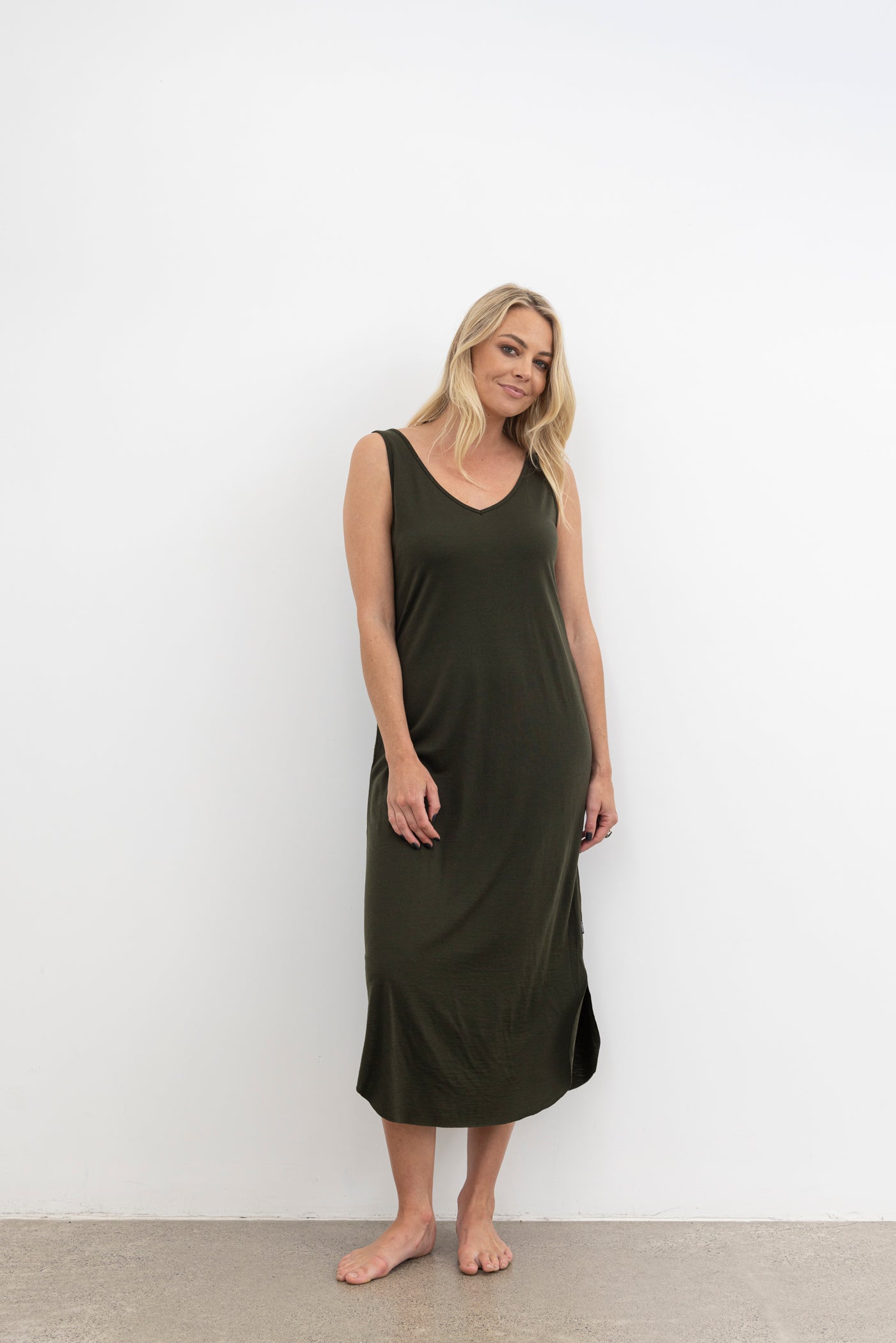 The NES Reversible Lattice Merino Slip is a&nbsp;layering essential with a clever twist — the Reversible Lattice Merino Slip offers two looks in one with its versatile design. Made from soft, breathable merino in our signature lattice knit, it's perfect for wearing under sheer styles or on its own as a luxe lounge piece. The slim fit sits comfortably against the body, providing warmth without bulk, and transitions seamlessly across seasons.
