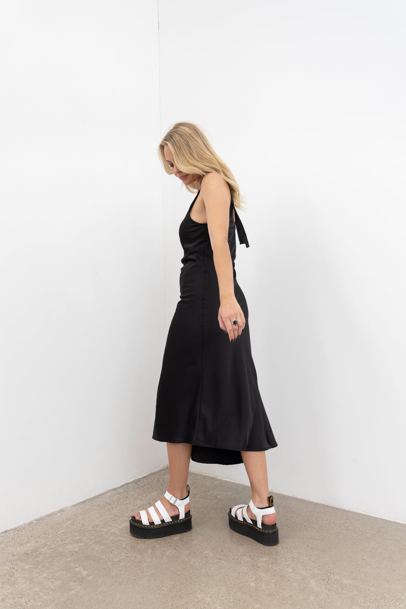 Vslip Dress is a great versatle style to have in your wardrobe. This style can be worn as a slip or a dress.

Tank style straps - cover a bra or if no bra is worn the front facing provides good coverage.

Back strap detailing - button and button holes. Allow the straps to be easily adjusted and crossed over to create a criss X back.

Cut on the bias this dress is figure hugging.

to dress the Vslip as a slip - layer the Civita dress or flow dress over the top to create texture and layering to your fav NES d