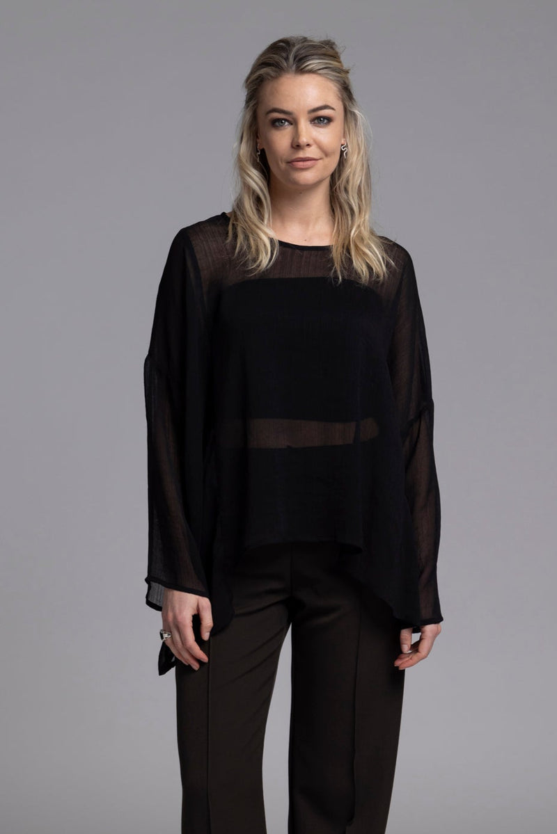 The Vita Top is our famous Civita Top with beautiful floaty sleeves added&nbsp;

Open sided dress, wear floaty or knotted to the side

Featuring an oversized flowy easy wearing top

Multi-seasonal &amp; easily dressed up or down