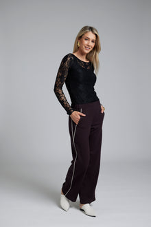 N-E-S Double Piped Gin Pants, designed and made in NZ – women’s classic straight-cut pants in a breathable cotton blend (99% wool, 1% Lycra) with flat front, elasticated back waistband, angled side pockets, and subtle piping along side seams and diagonal pocket edges; 32" length, versatile for work, weekends, or dress-up wear, in Plum.