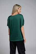 The N-E-S Vanotti Tunic – a floaty scoop-neck tunic in viscose georgette or satin. Wear loose or drawn in. Sizes XS/S, SM, ML. NZ made.