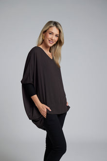 The N-E-S Virtue Tunic – a floaty, relaxed tunic with a scoop neck, curved hem and effortless drape. Perfect layered over a Lattice Singlet. NZ made.