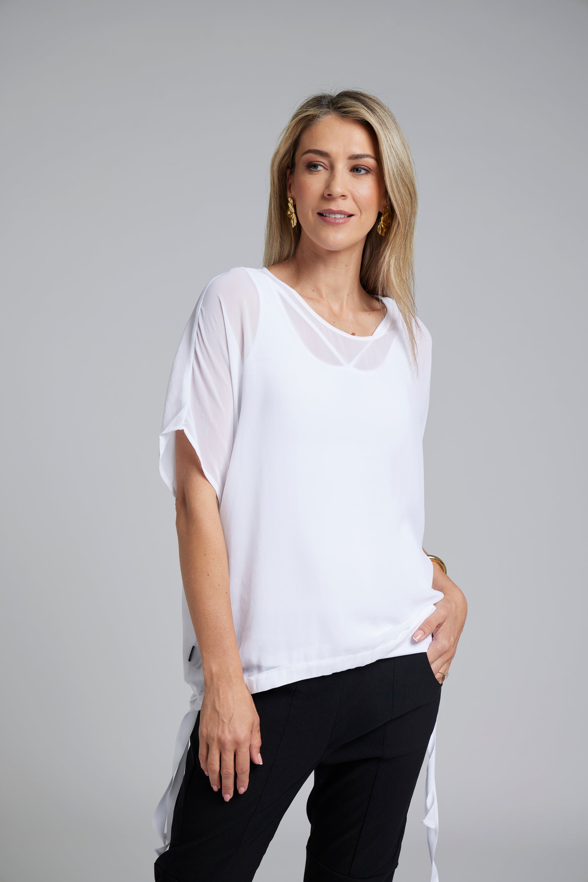 The Vanotti Tunic – N-E-S’ best-selling throw-on top with a scoop neckline and adjustable feature hem. Perfect over a Lattice Singlet. NZ made.