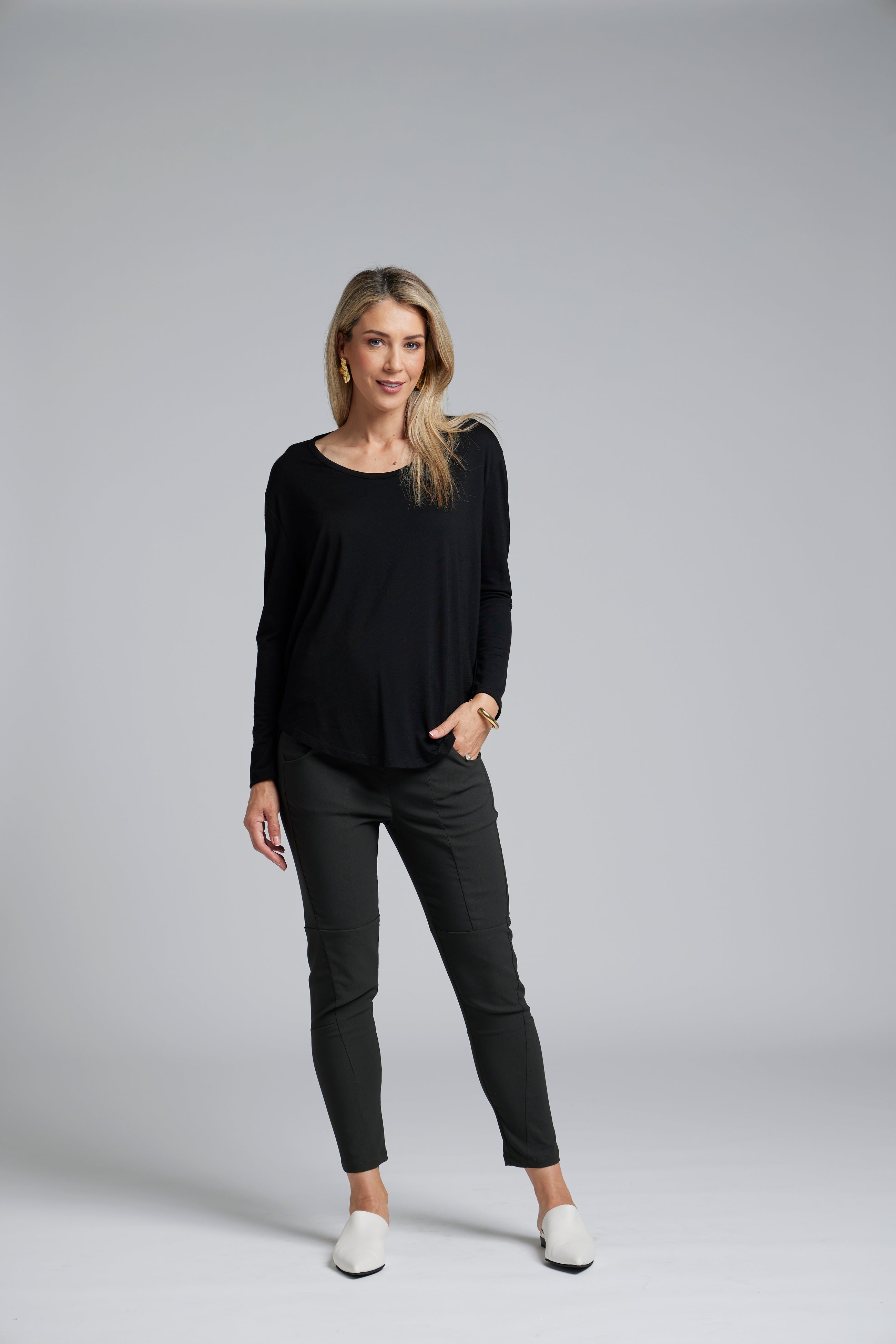 The N-E-S Section Pant – a sleek ankle-length stretch pant with panel detailing, flat front and elastic back. Available in Black, Artillery and Ink. NZ made.