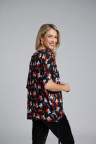 The N-E-S Vanotti Tunic – a floaty scoop-neck tunic in viscose georgette or satin. Wear loose or drawn in. Sizes XS/S, SM, ML. NZ made.