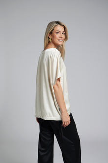 The N-E-S Vanotti Tunic – a floaty scoop-neck tunic in viscose georgette or satin. Wear loose or drawn in. Sizes XS/S, SM, ML. NZ made.
