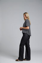 The N-E-S DollyB Denim Pants – a wide-leg stretch denim pant with fold-down rib waistband and contrast stitching. Available in blue or black denim. NZ made.