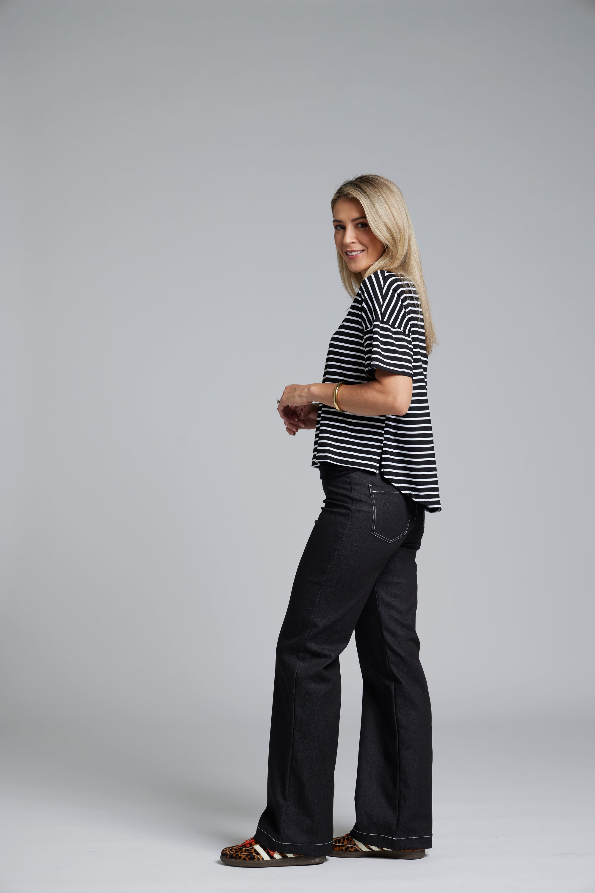 The N-E-S DollyB Denim Pants – a wide-leg stretch denim pant with fold-down rib waistband and contrast stitching. Available in blue or black denim. NZ made.